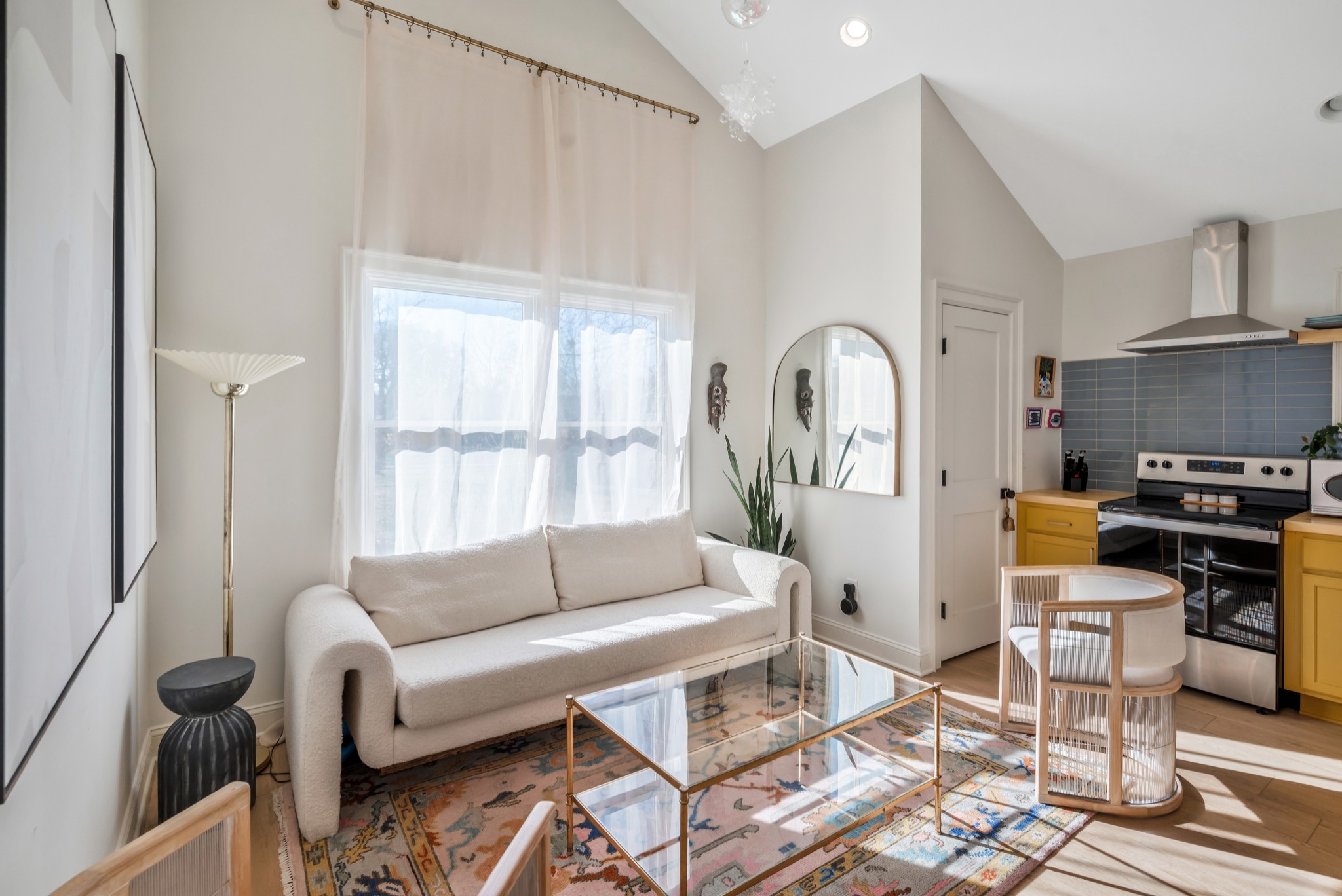 1007 Lischey Avenue Nashville, TN 37207 - Photo 46 of 52 a living room with furniture a wooden floor and a large window
