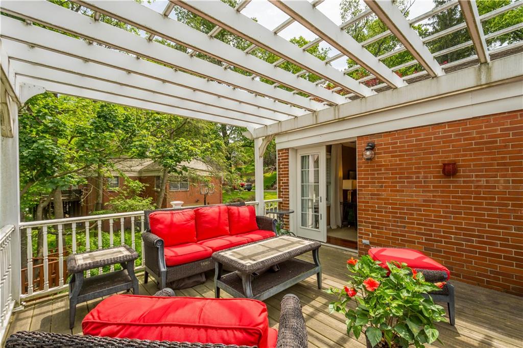 1580 Williamsburg Road Pittsburgh, PA 15243 - Photo 17 of 41 a balcony with furniture and wooden floor