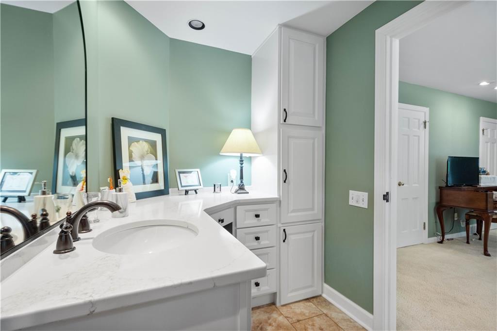 1580 Williamsburg Road Pittsburgh, PA 15243 - Photo 22 of 41 a en suite bathroom with a sink double vanity and a mirror
