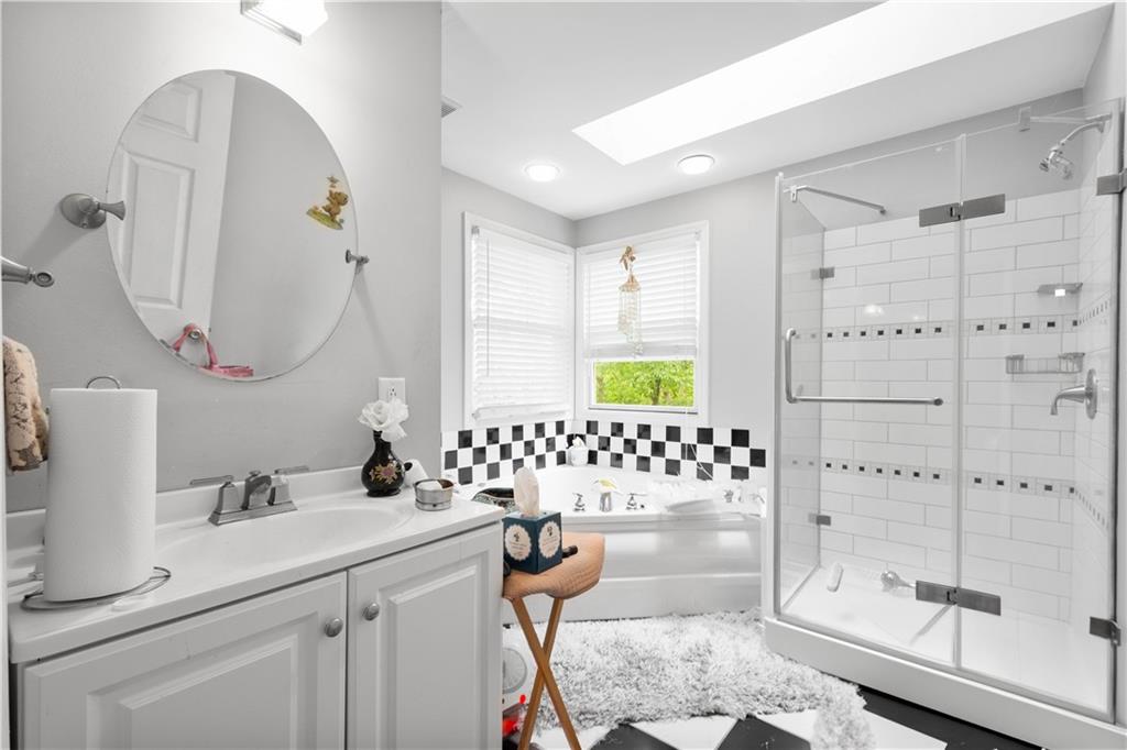 1580 Williamsburg Road Pittsburgh, PA 15243 - Photo 25 of 41 a bathroom with a double vanity sink mirror and shower