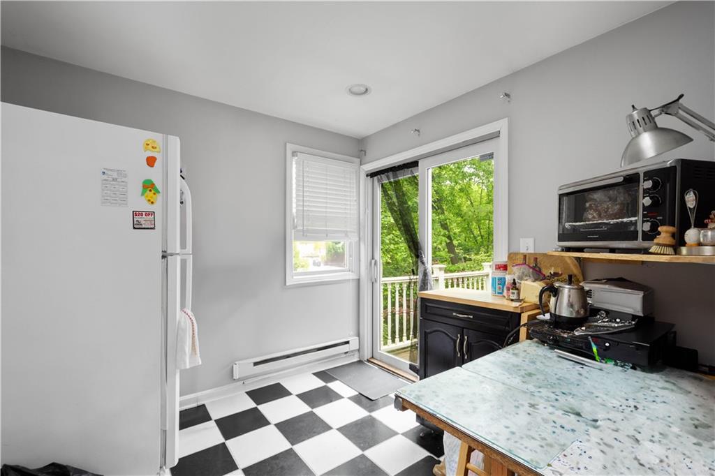 1580 Williamsburg Road Pittsburgh, PA 15243 - Photo 26 of 41 a view of a workspace with furniture and a window