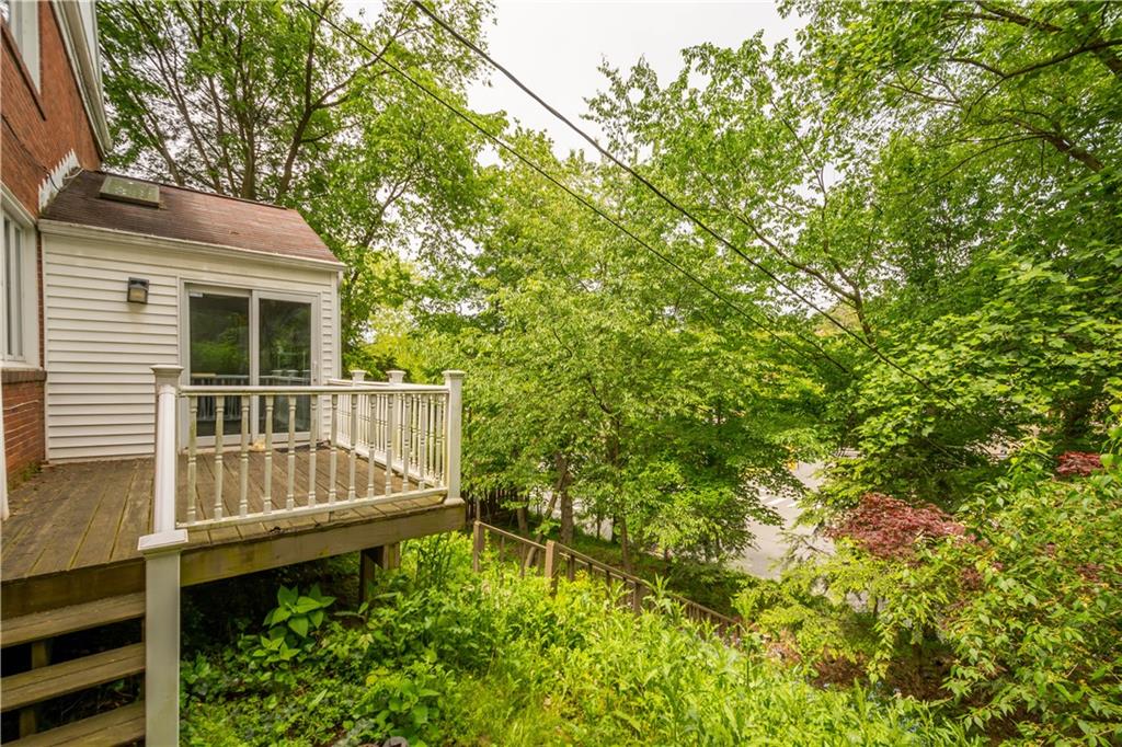 1580 Williamsburg Road Pittsburgh, PA 15243 - Photo 32 of 41 a view of a house with a small yard and wooden fence