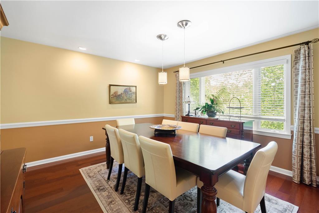 1580 Williamsburg Road Pittsburgh, PA 15243 - Photo 9 of 41 a view of a dining room with furniture window and wooden floor