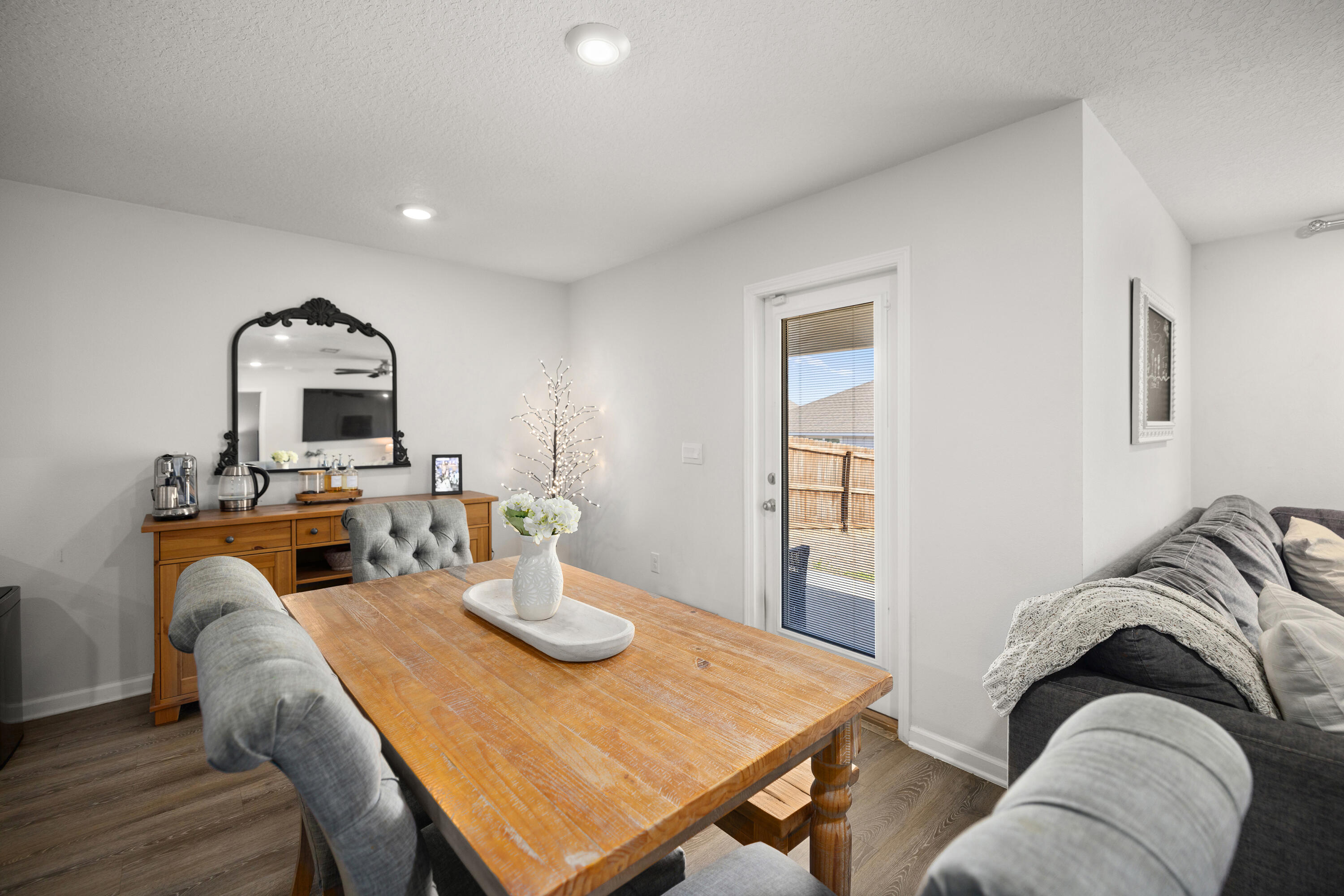 211 Laurel Hill Street Crestview, FL 32539 - Photo 21 of 60 a living room with furniture and a flat screen tv