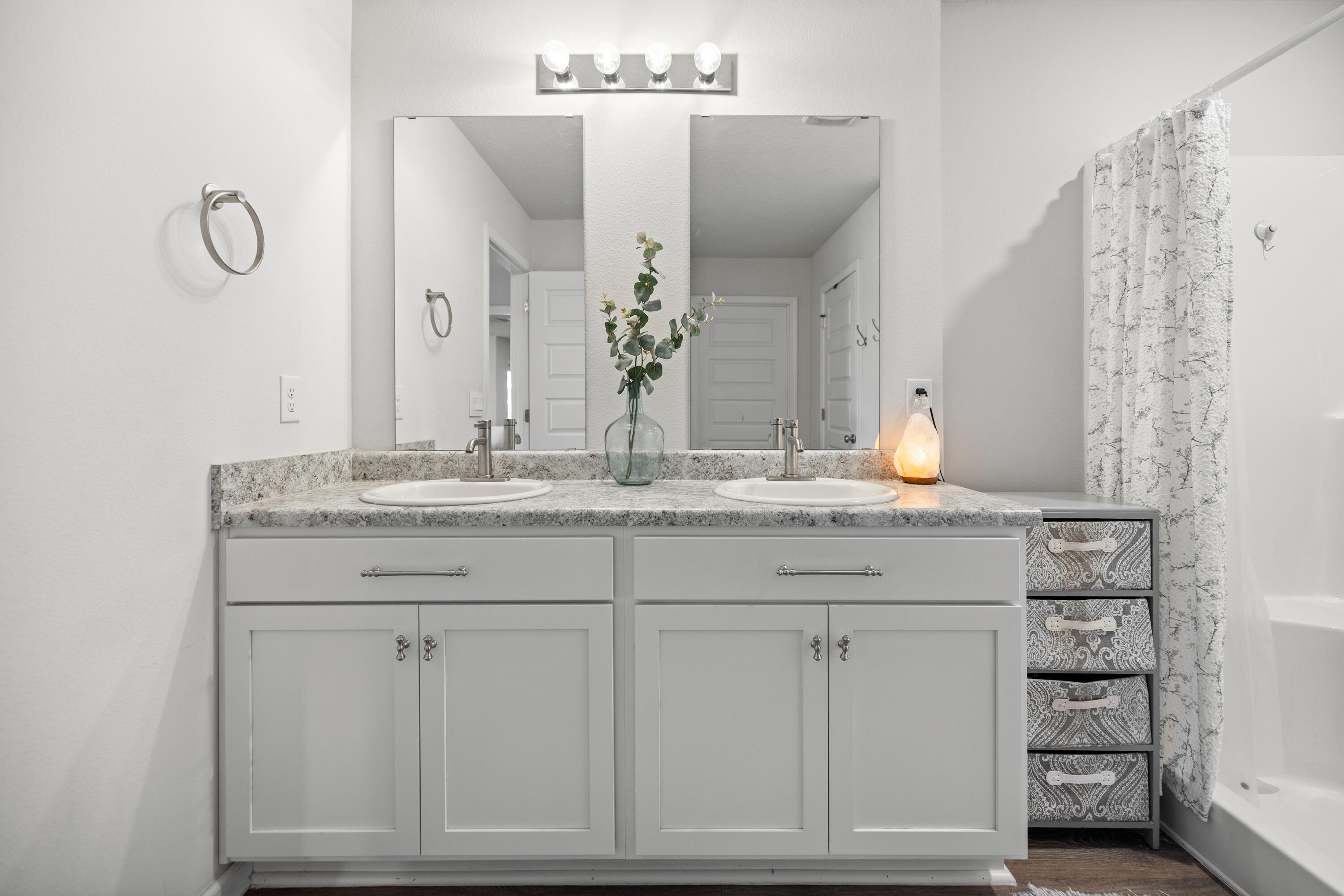 211 Laurel Hill Street Crestview, FL 32539 - Photo 27 of 60 a bathroom with a granite countertop sink and a mirror
