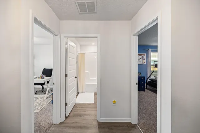a view of living room with furniture and window