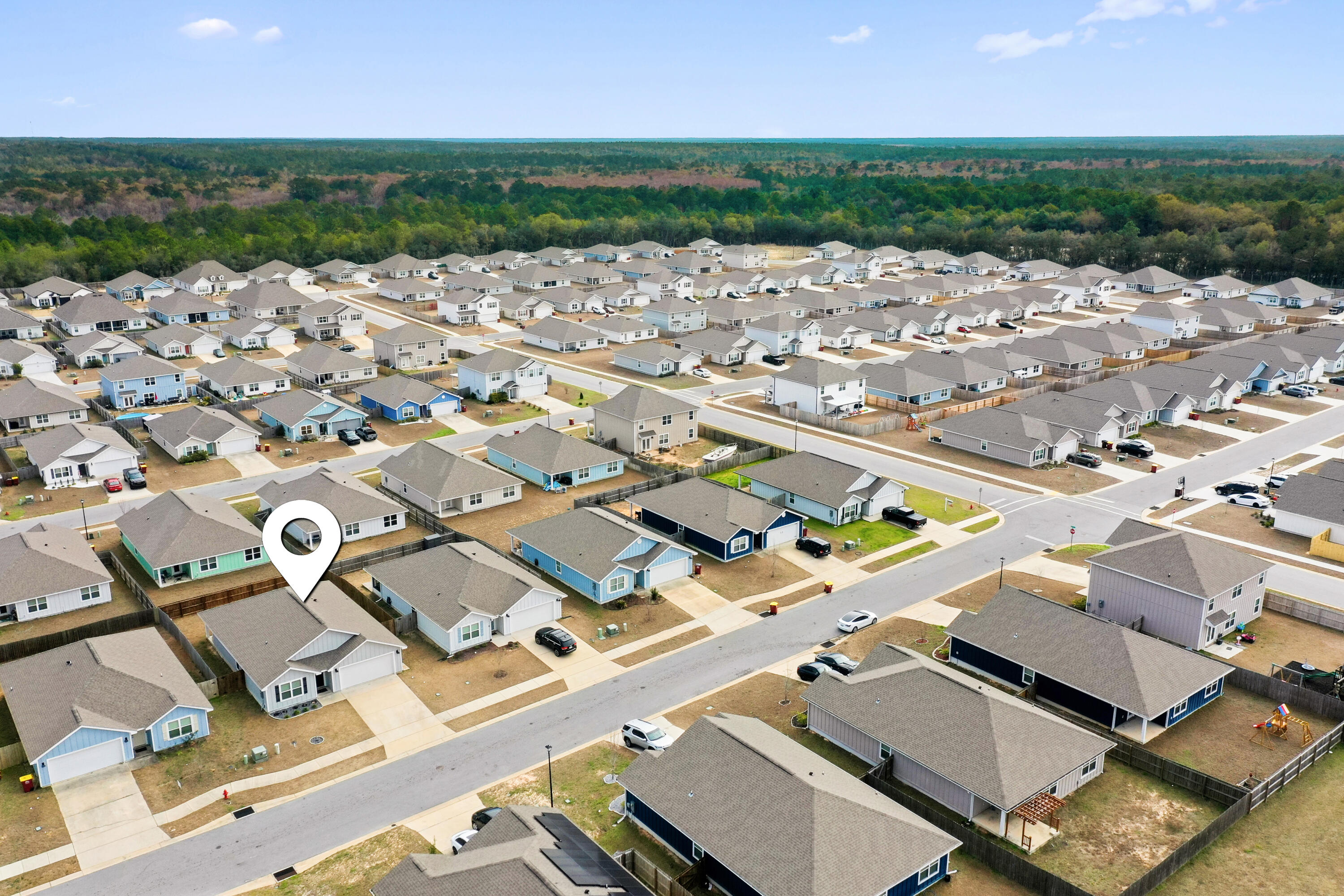 211 Laurel Hill Street Crestview, FL 32539 - Photo 55 of 60 an aerial view of a house with a outdoor space