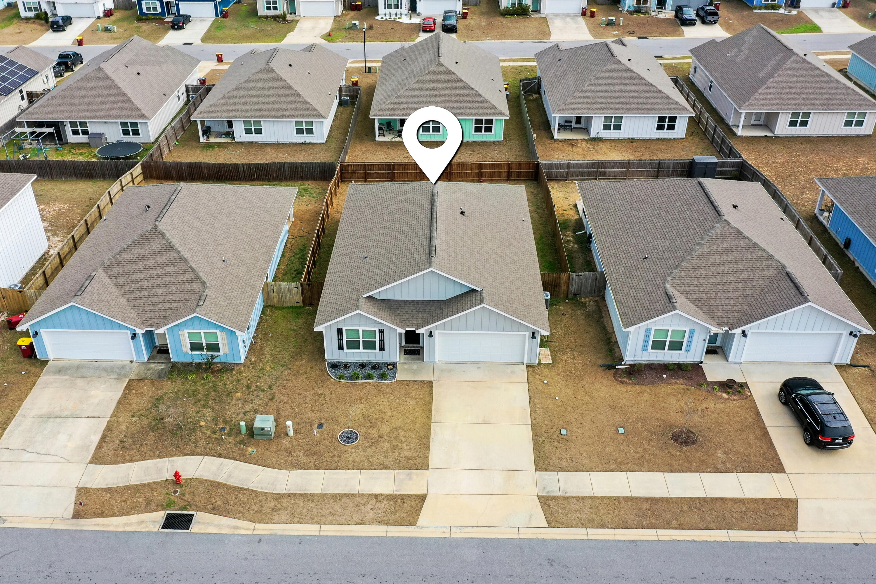 211 Laurel Hill Street Crestview, FL 32539 - Photo 56 of 60 an aerial view of residential houses with outdoor space