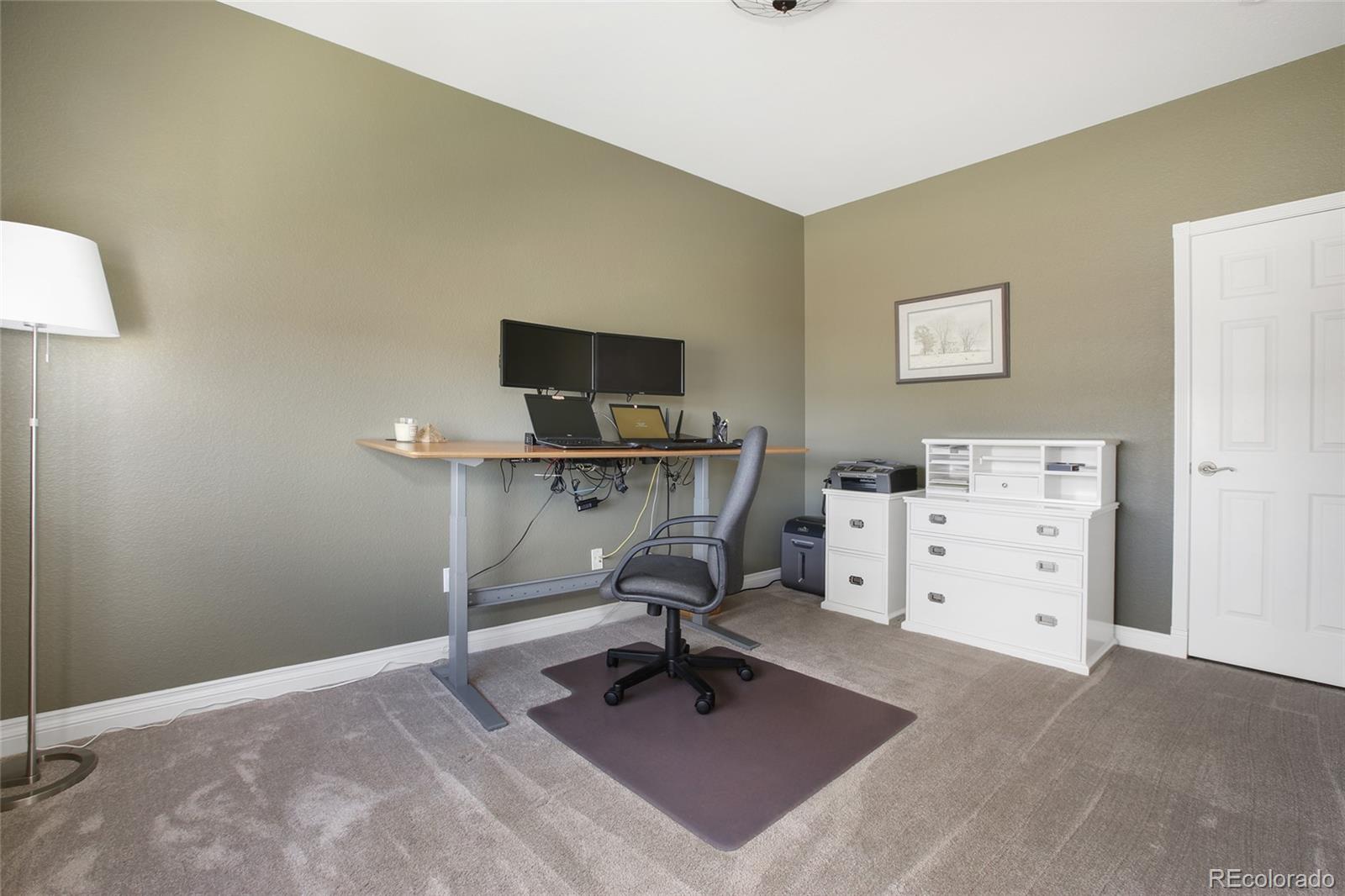 10274 Willowbridge Court Highlands Ranch, CO 80126 - Photo 15 of 35 a view of a workspace with furniture