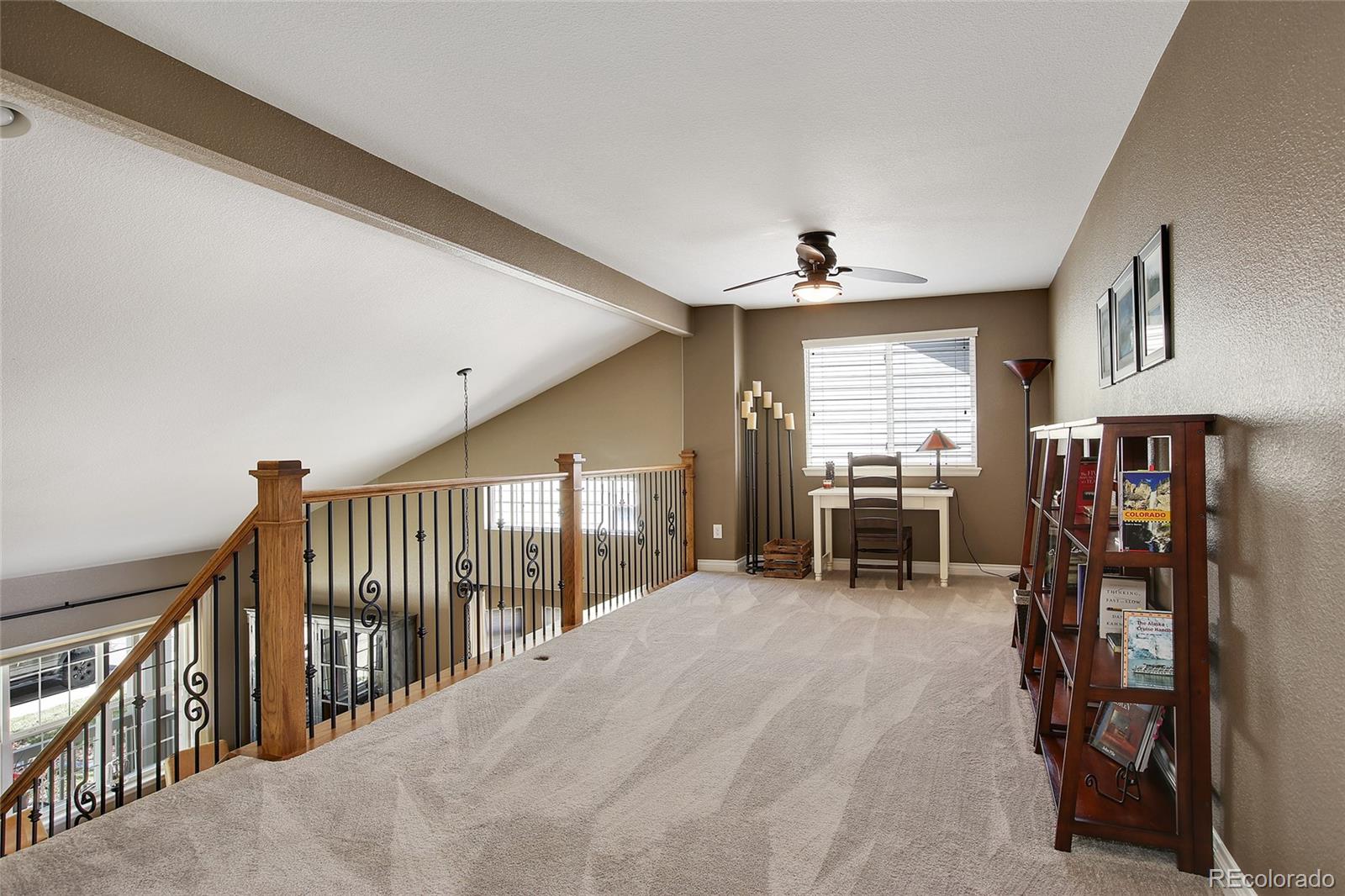 10274 Willowbridge Court Highlands Ranch, CO 80126 - Photo 17 of 35 a view of livingroom with furniture and windows