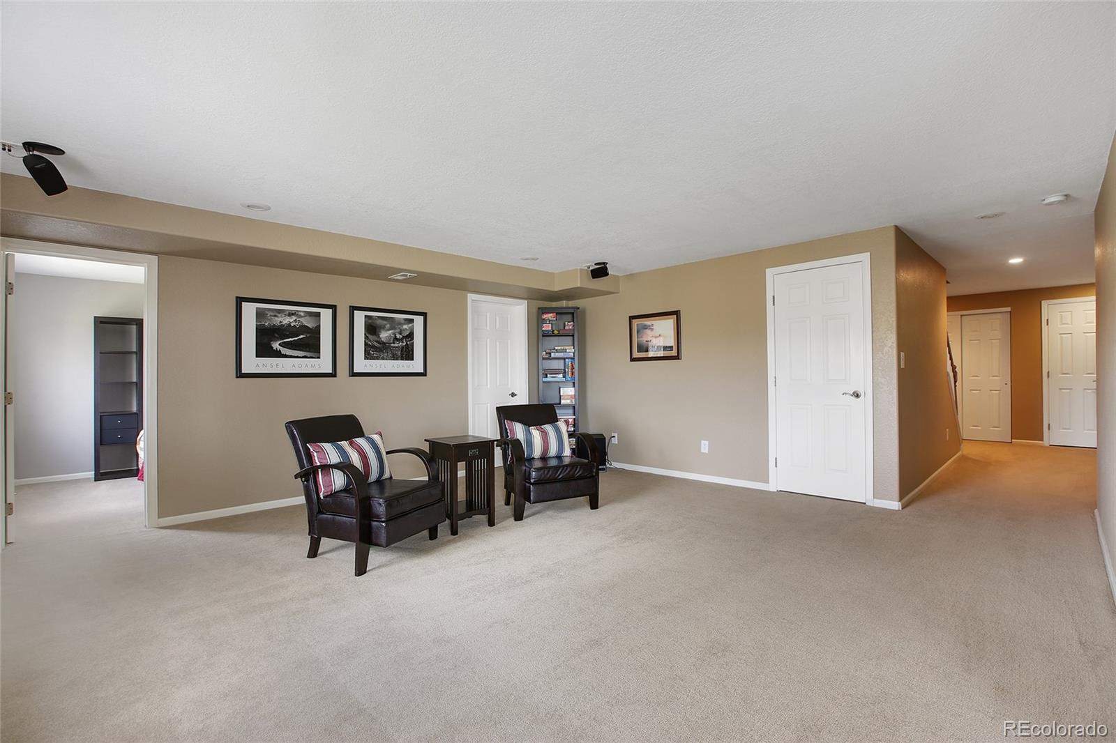 10274 Willowbridge Court Highlands Ranch, CO 80126 - Photo 25 of 35 a view of a livingroom with furniture and windows