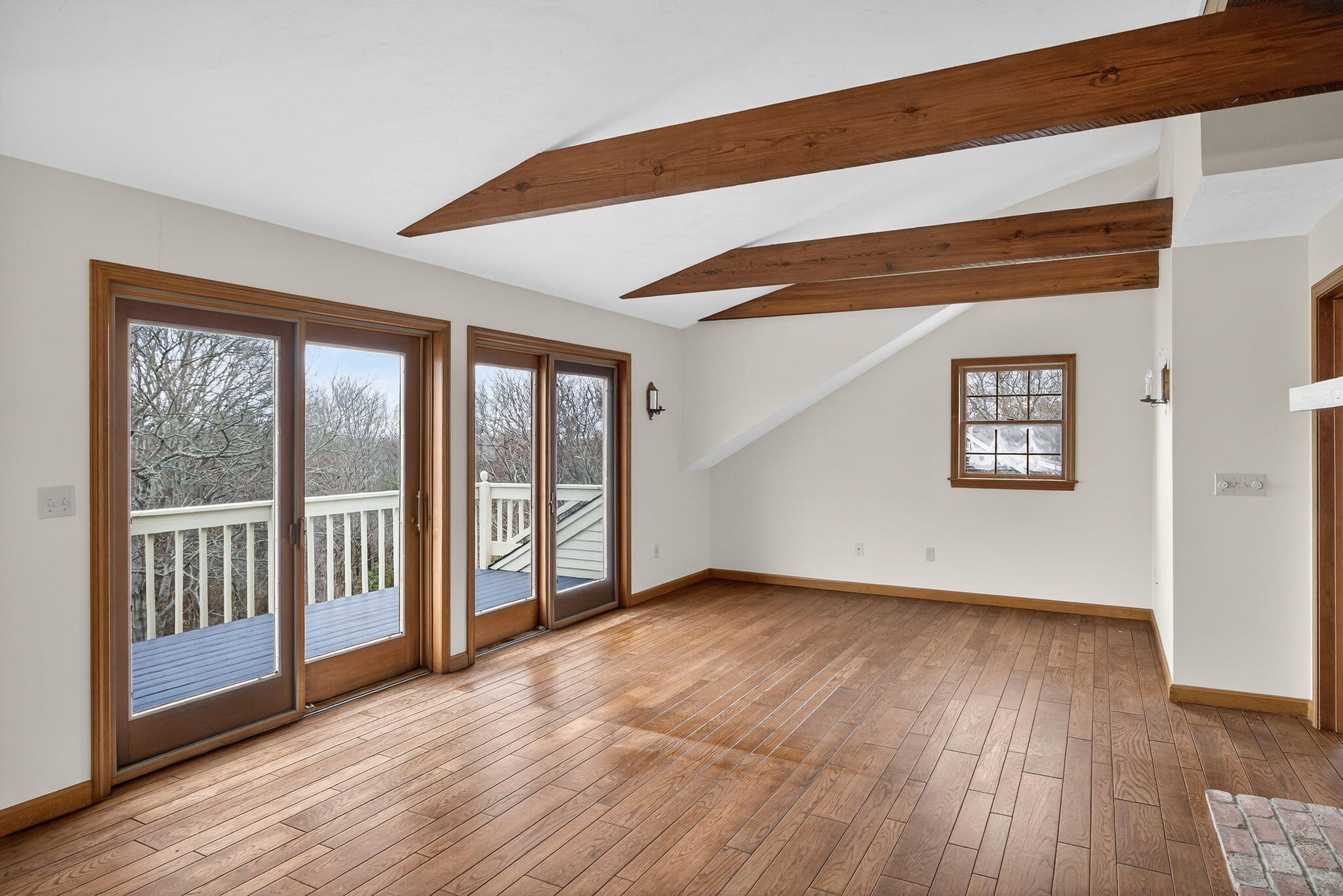 4 Earl Road East Sandwich, MA 02537 - Photo 11 of 63 a view of an empty room with wooden floor and a window