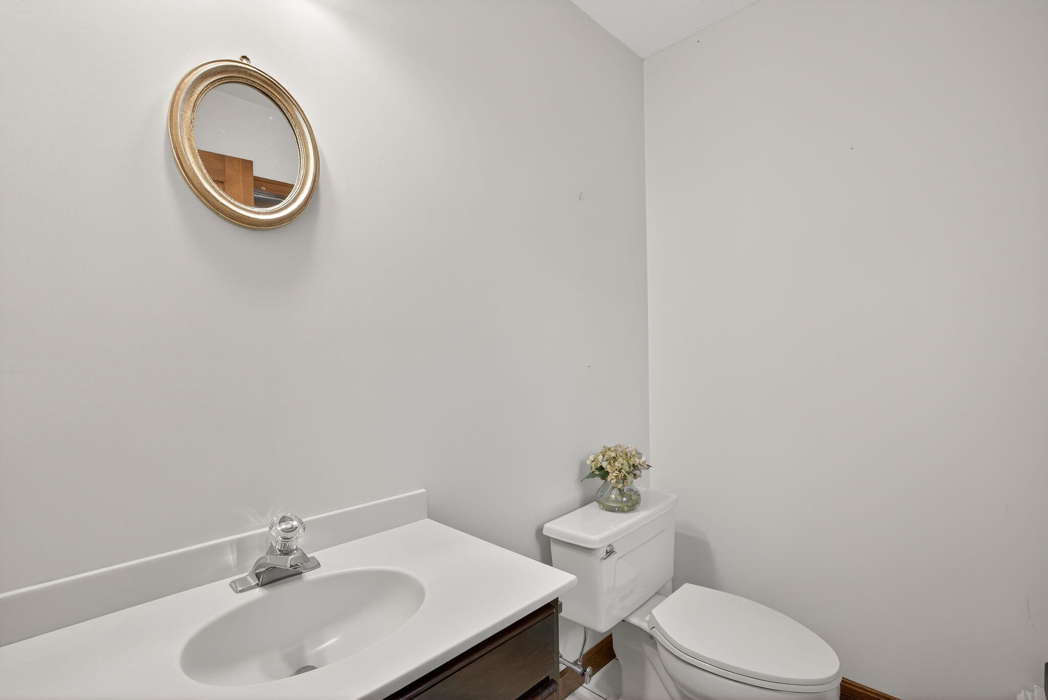 4 Earl Road East Sandwich, MA 02537 - Photo 22 of 63 a bathroom with a toilet a sink and a mirror