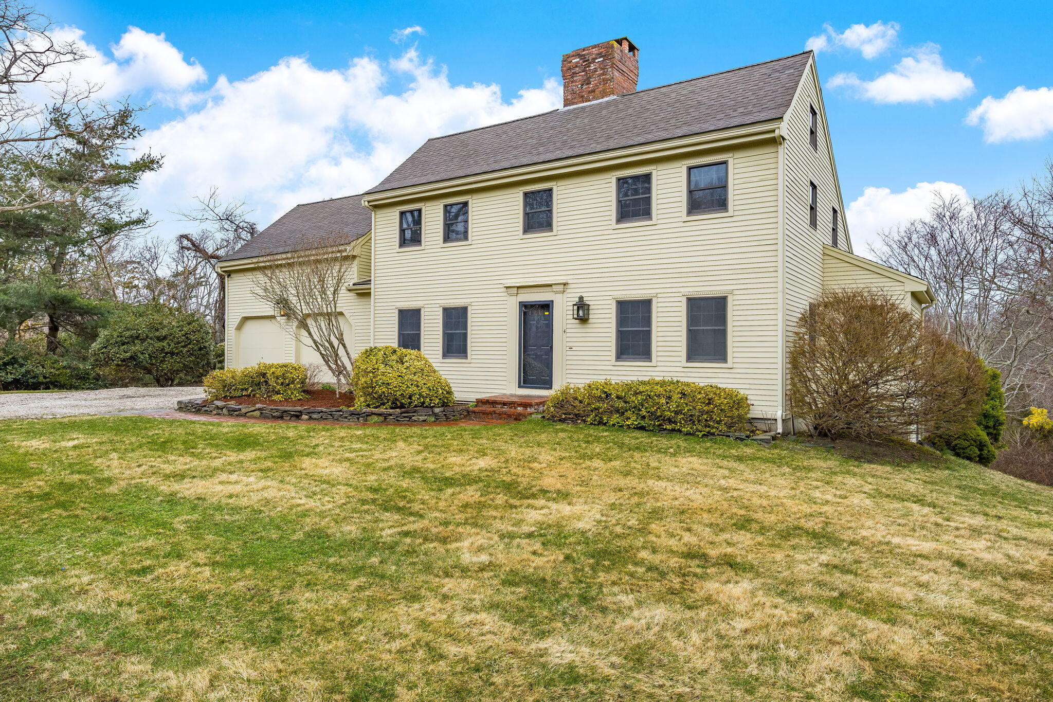 4 Earl Road East Sandwich, MA 02537 - Photo 30 of 63 a front view of a house with a yard