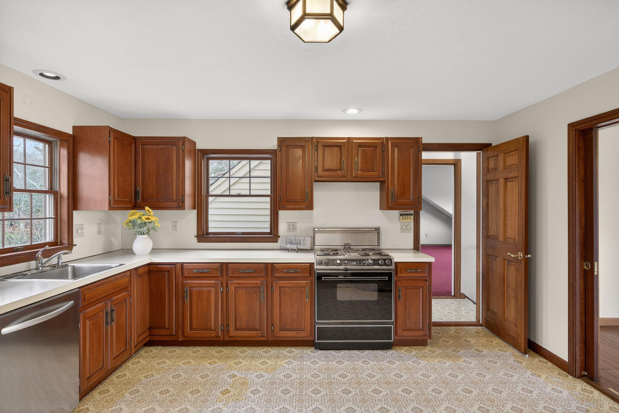 4 Earl Road East Sandwich, MA 02537 - Photo 5 of 63 a kitchen with stainless steel appliances a stove a sink and a refrigerator