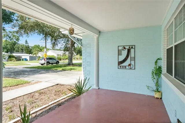 a bathroom with double vanity sink a toilet a mirror and shower