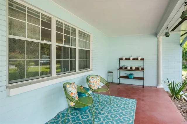 a bathroom with a sink mirror and toilet