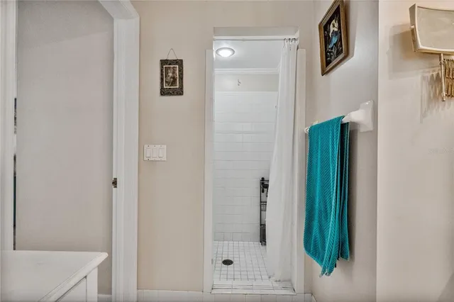 a living room with furniture fireplace and a window
