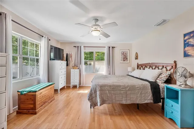 a living room with furniture fireplace and flat screen tv