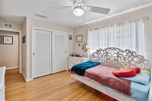 a kitchen with a sink appliances and cabinets