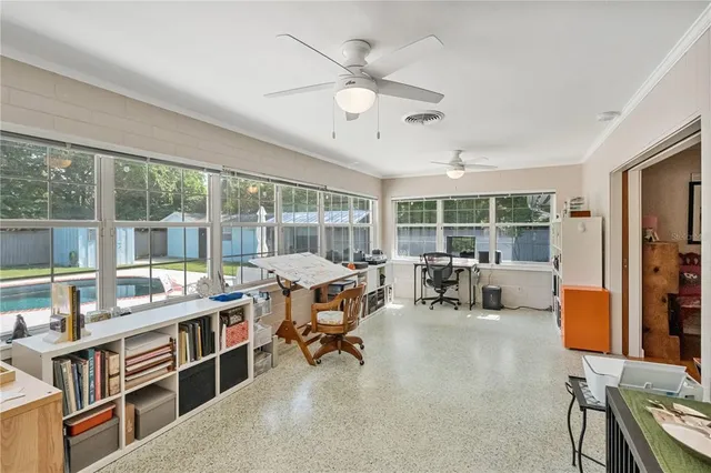 a kitchen with a refrigerator and a sink