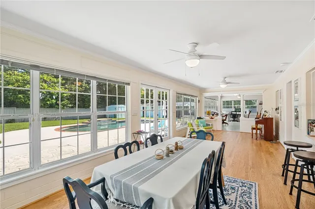 an aerial view of a house with a swimming pool