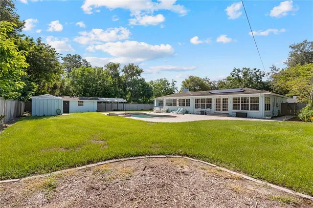 an aerial view of residential building with parking space