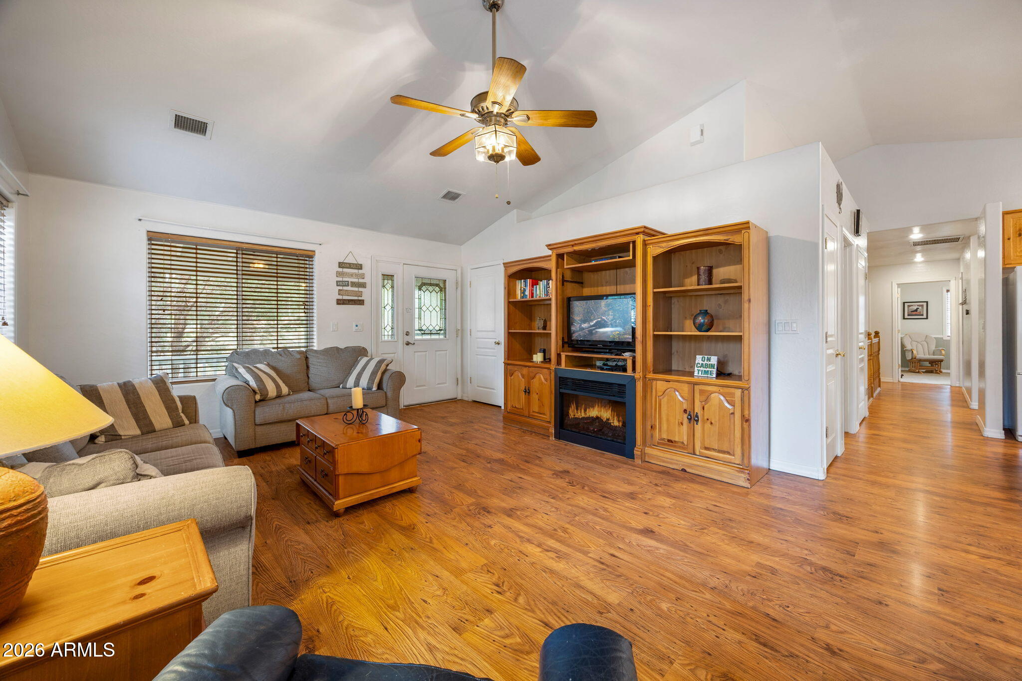 2236 Cross Country Road Overgaard, AZ 85933 - Photo 11 of 59 a living room with furniture and a flat screen tv