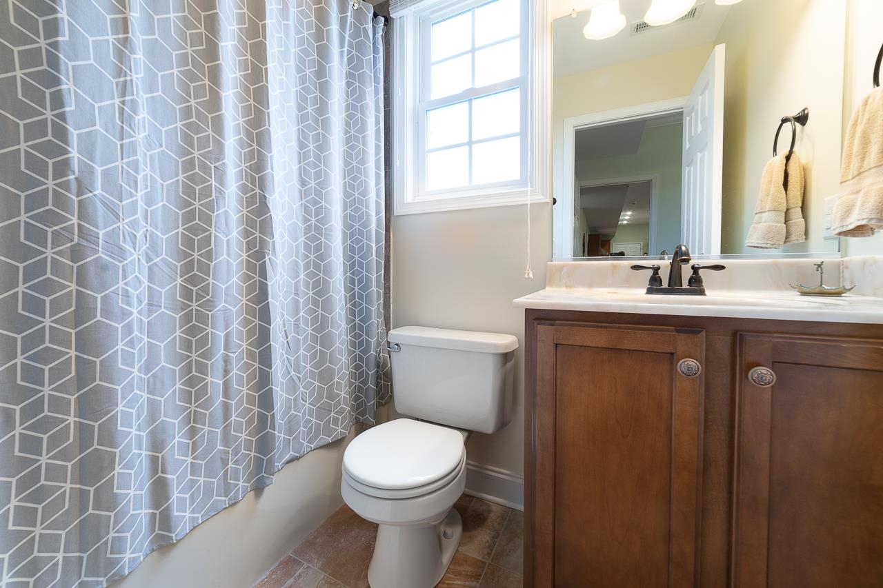 1733 Ridge Road Raphine, VA 24472 - Photo 18 of 32 a bathroom with a sink a toilet and shower