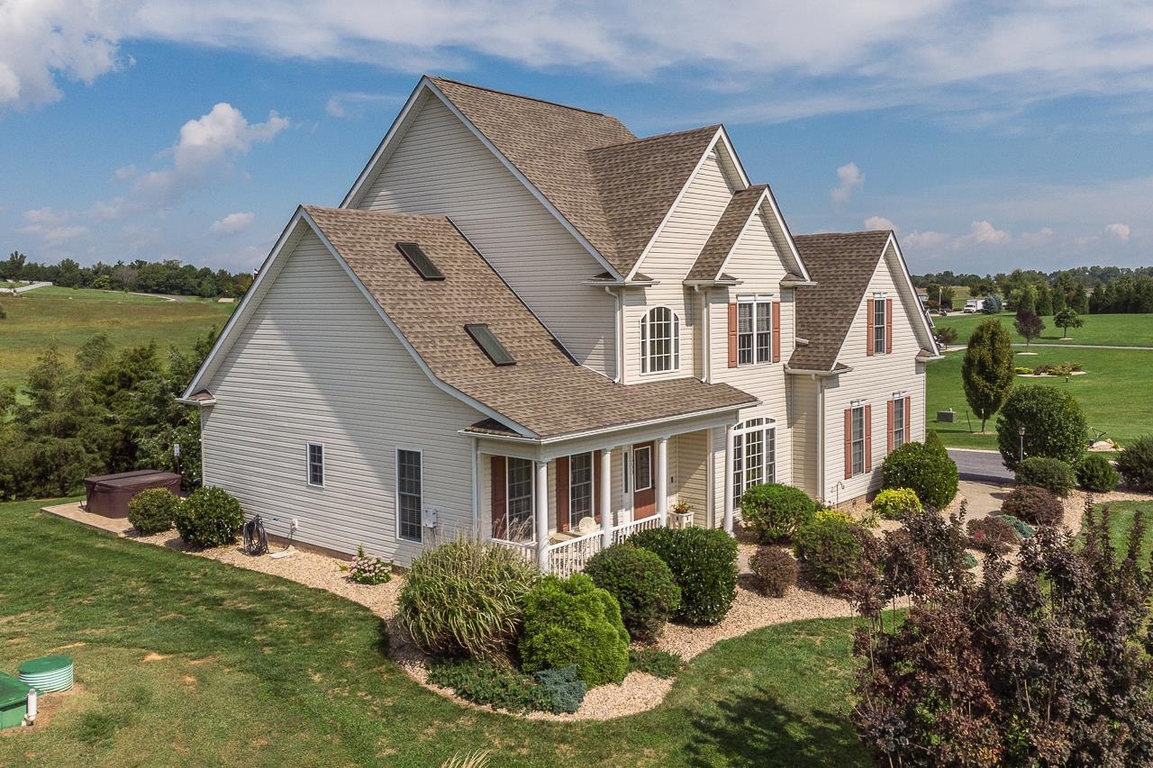 1733 Ridge Road Raphine, VA 24472 - Photo 2 of 32 a view of a house with a yard and potted plants