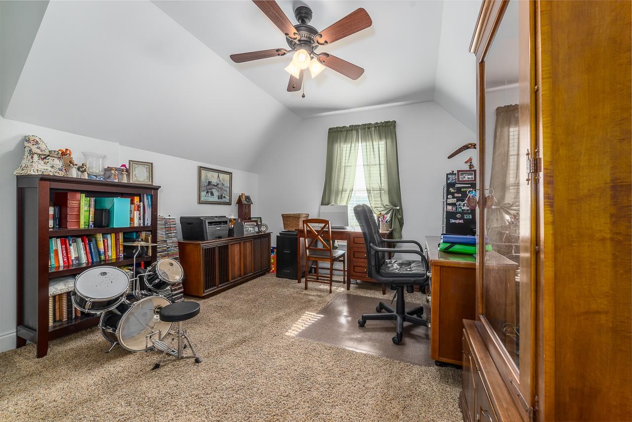 1733 Ridge Road Raphine, VA 24472 - Photo 26 of 32 a view of a workspace with furniture and a window