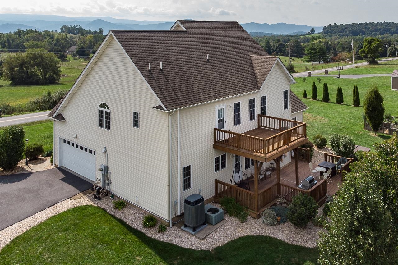 1733 Ridge Road Raphine, VA 24472 - Photo 4 of 32 an aerial view of a house with a yard