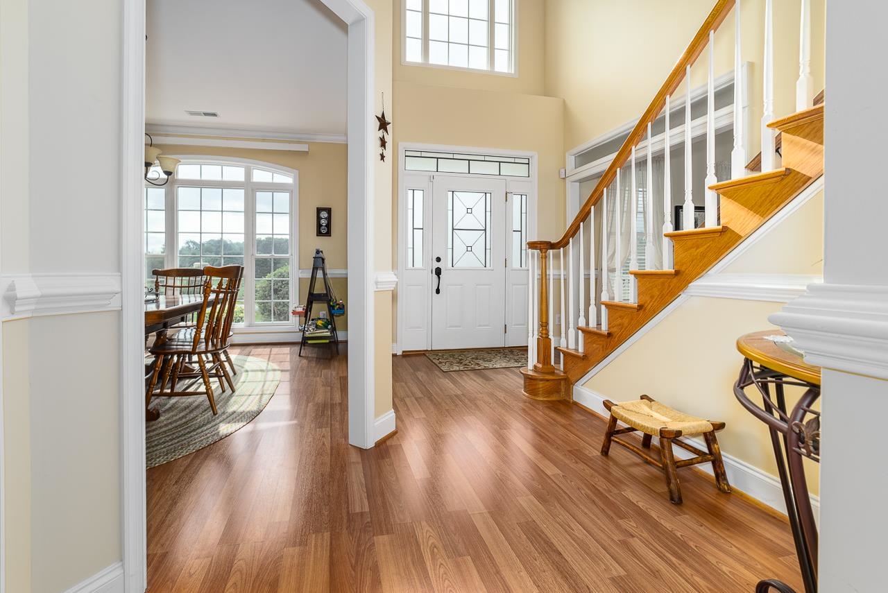 1733 Ridge Road Raphine, VA 24472 - Photo 7 of 32 a view of dining room with wooden floor and large windows