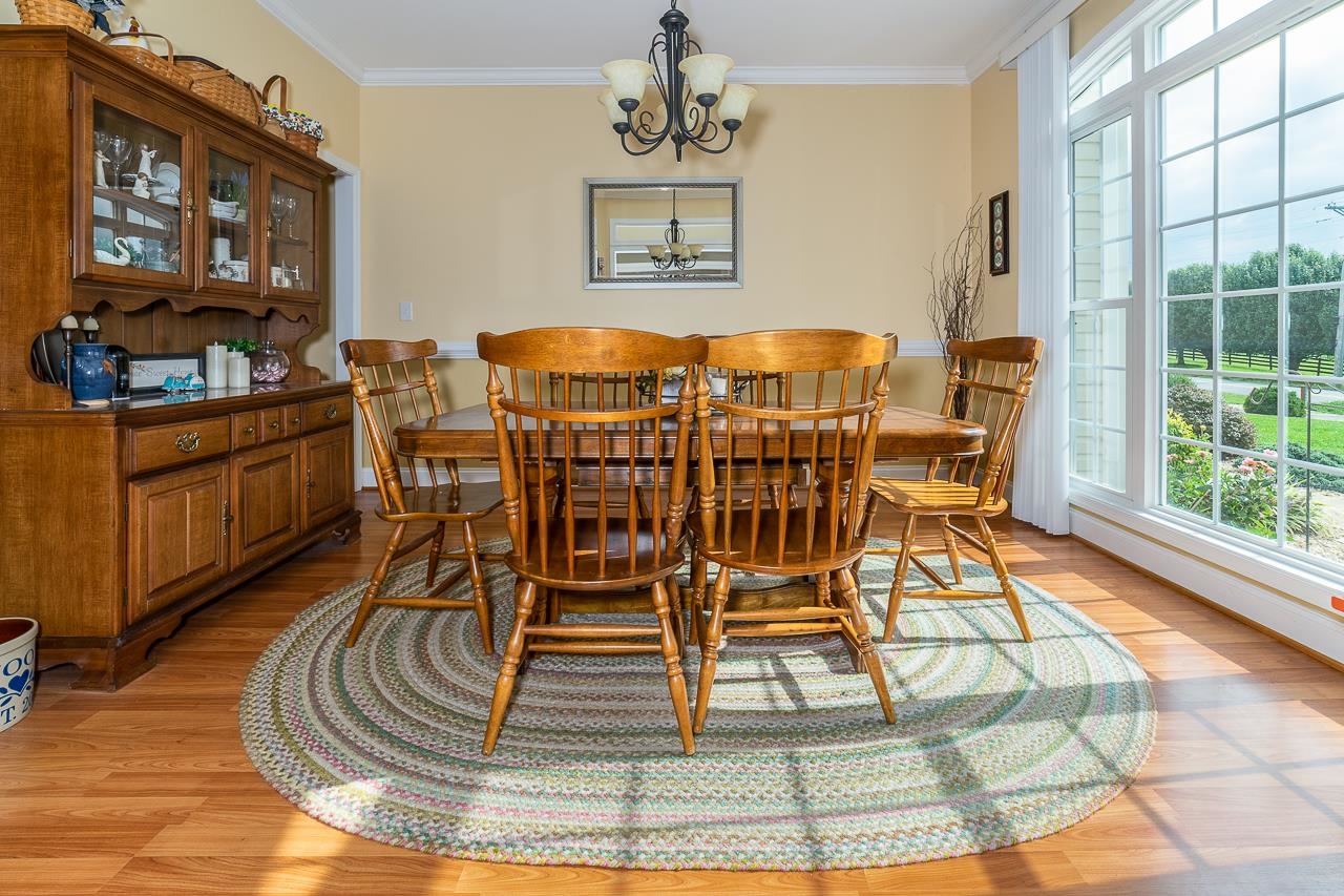 1733 Ridge Road Raphine, VA 24472 - Photo 9 of 32 a dining room table with chairs and window