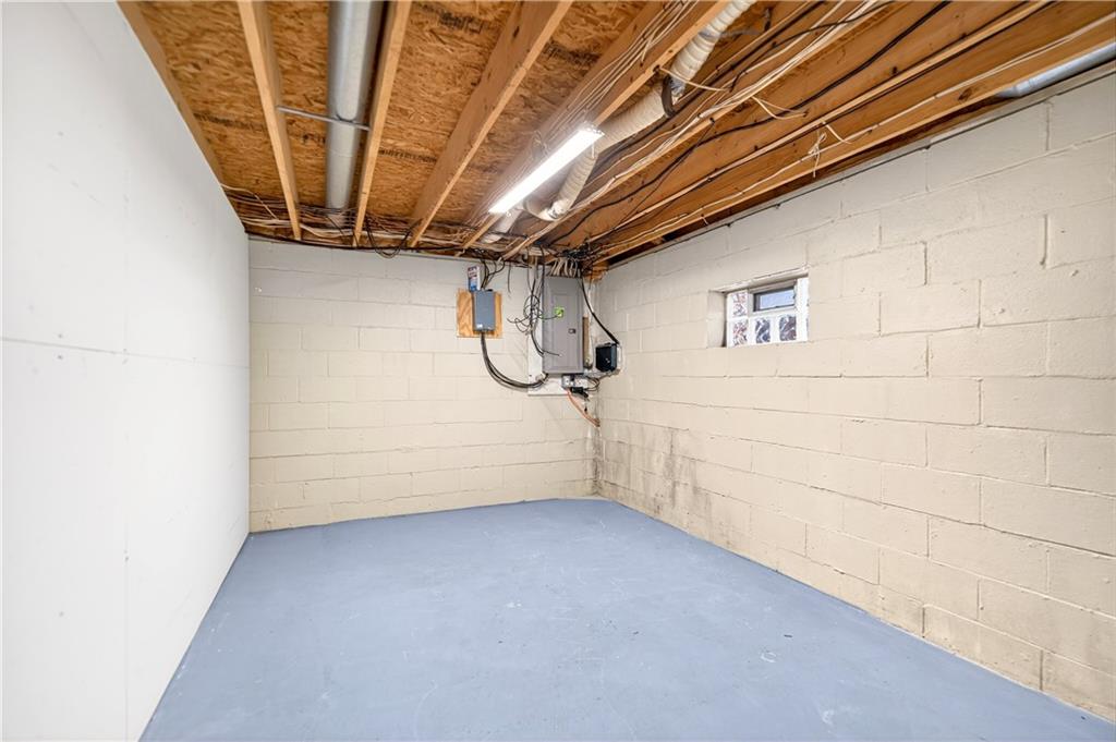 1270 Mudlick Hollow Road Beaver, PA 15009 - Photo 33 of 49 Extra storage room in lower level with barn door.