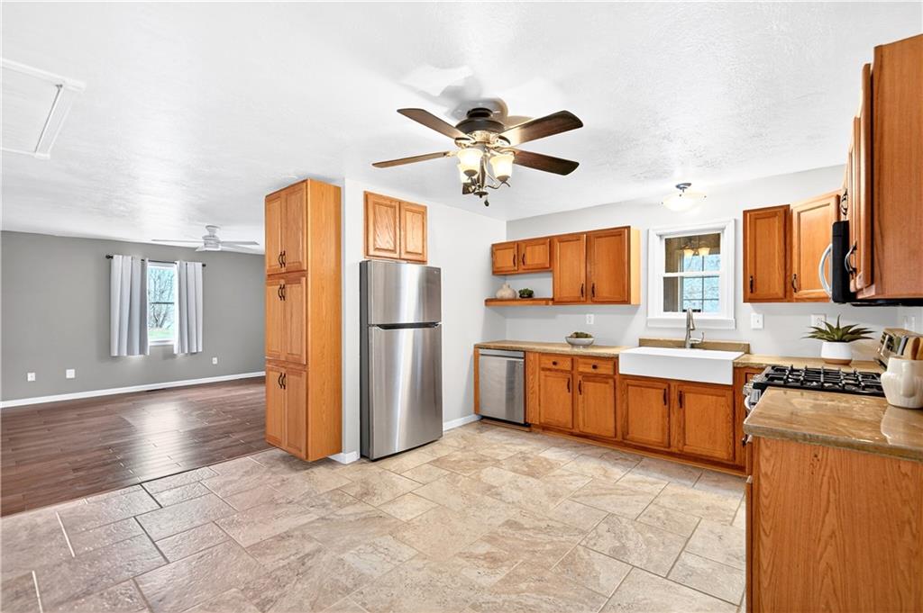 1270 Mudlick Hollow Road Beaver, PA 15009 - Photo 4 of 49 Kitchen highlights custom concrete countertops and apron sink.