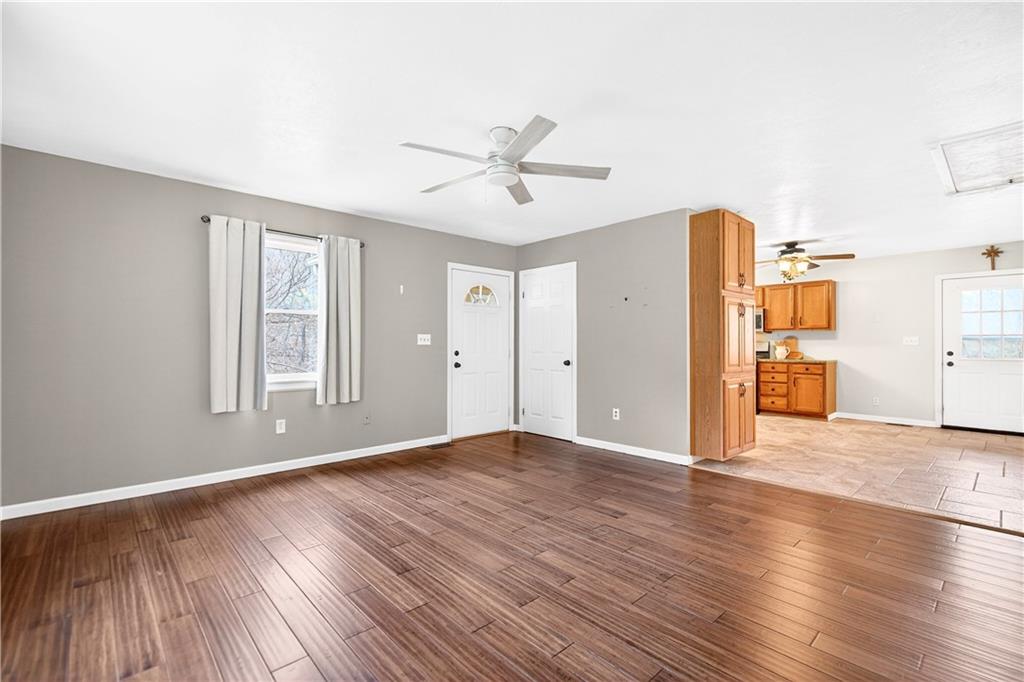 1270 Mudlick Hollow Road Beaver, PA 15009 - Photo 10 of 49 Living room opens up into the large kitchen.