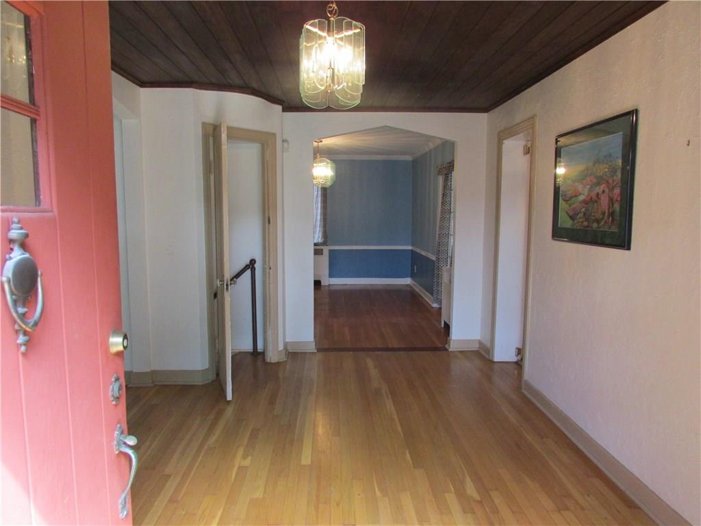 138 Crescent Hills Road Pittsburgh, PA 15235 - Photo 3 of 25 Come on in! Front Entryway leads to Living Room on left, basement, Dining Room, Kitchen on right. Lovely hardwood floors on this level.