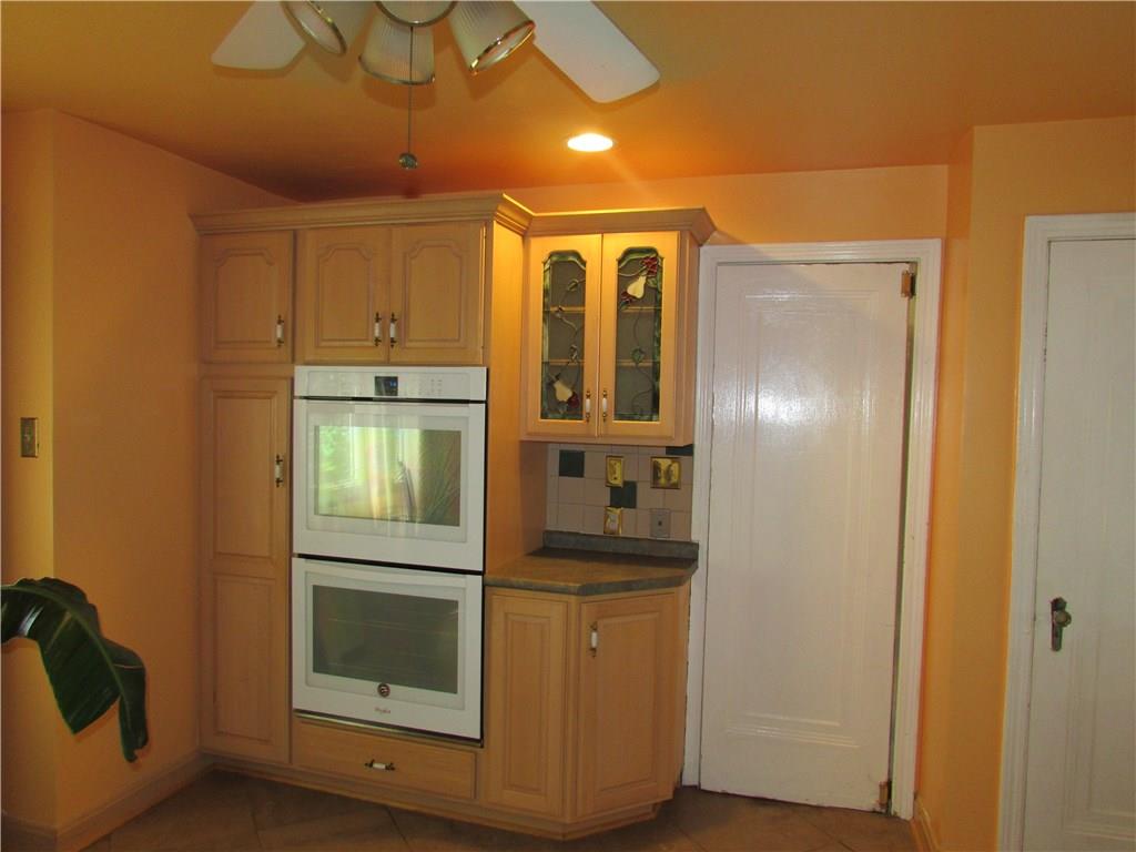 138 Crescent Hills Road Pittsburgh, PA 15235 - Photo 8 of 25 Double ovens are perfect for large family dinners. Pantry on right.