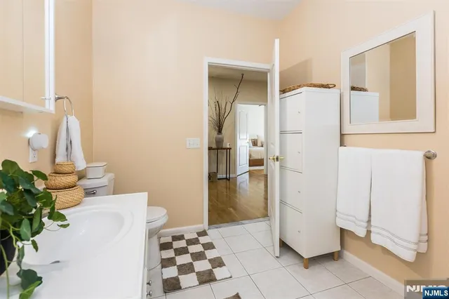 a view of a storage & utility room with a sink