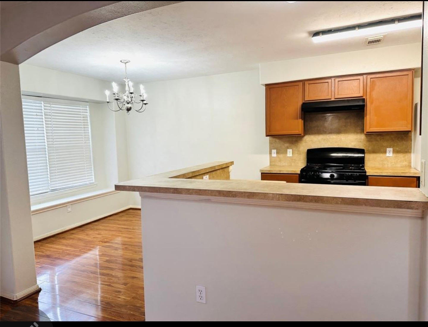 7203 Calcutta Spring Drive Houston, TX 77083 - Photo 5 of 14 a bathroom with a sink a mirror and a window