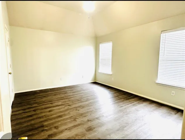a view of an empty room and window