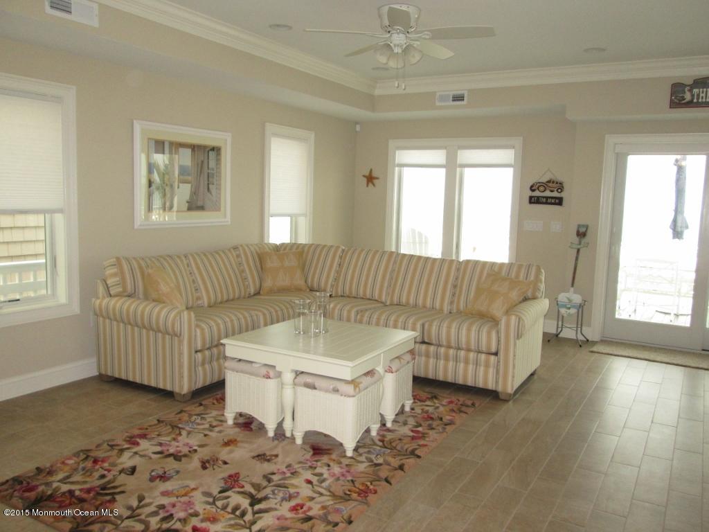 3450 Ocean Road Lavallette, NJ 08735 - Photo 8 of 31 a living room with furniture and a couch
