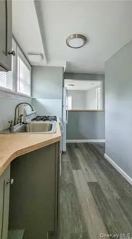 a utility room with a sink