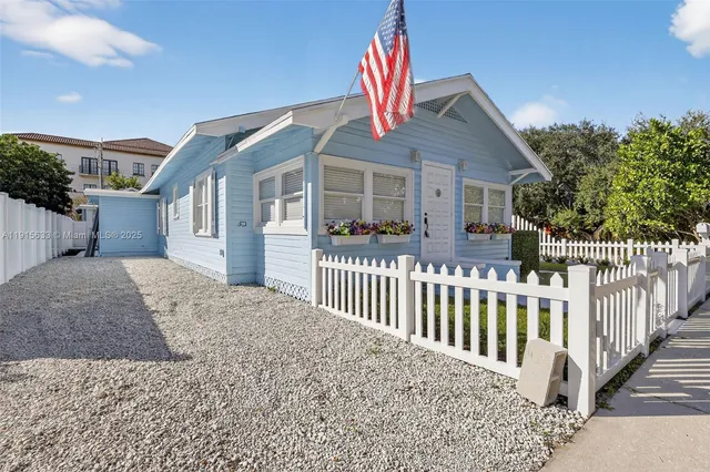 a front view of a house with a porch
