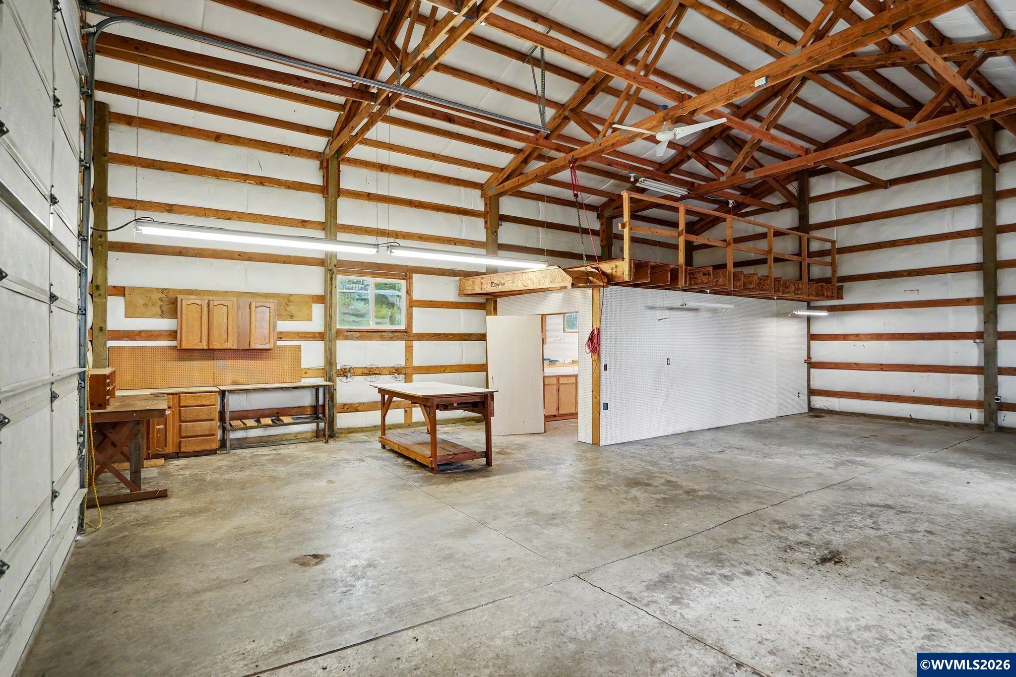 1299 Twin Hills Road Southeast Jefferson, OR 97352 - Photo 41 of 47 a view of a room with racks on the wall