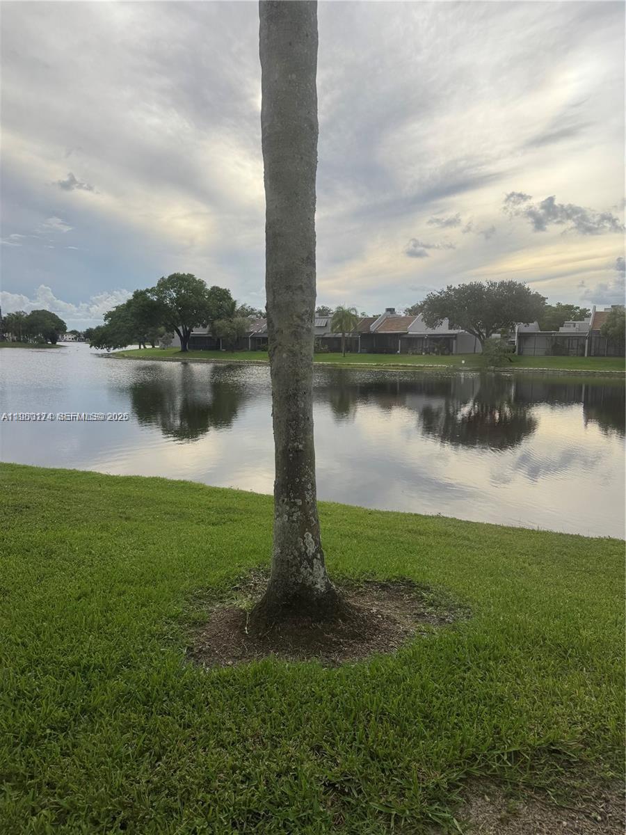1226 North Hiatus Road, Unit 1226 Pembroke Pines, FL 33026 - Photo 2 of 10 a view of a lake