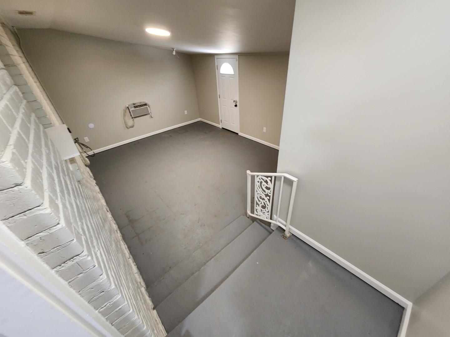 5259 Sequoia Road Memphis, TN 38120 - Photo 15 of 36 a view of a hallway with stairs