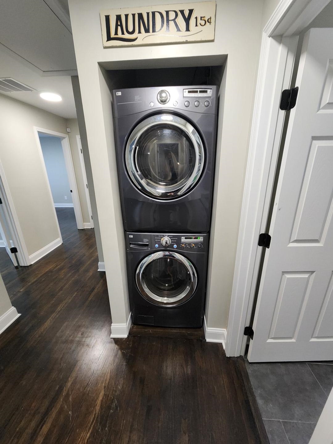 5259 Sequoia Road Memphis, TN 38120 - Photo 19 of 36 a view of a hallway with washer and dryer