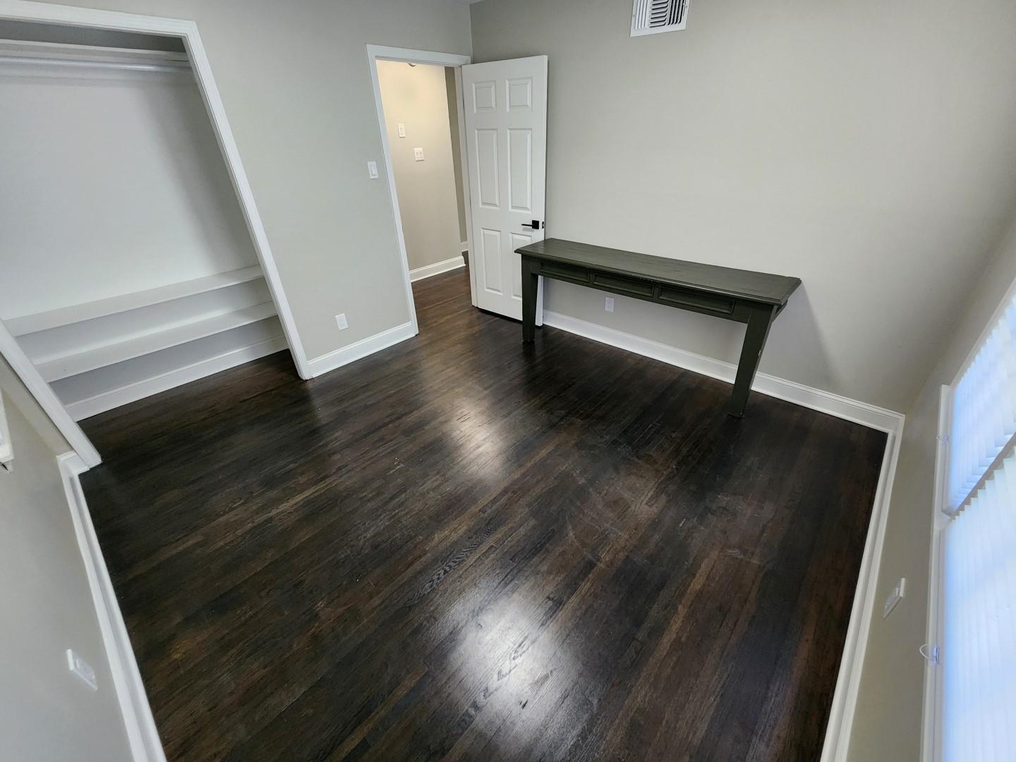5259 Sequoia Road Memphis, TN 38120 - Photo 26 of 36 a view of wooden floor in a room